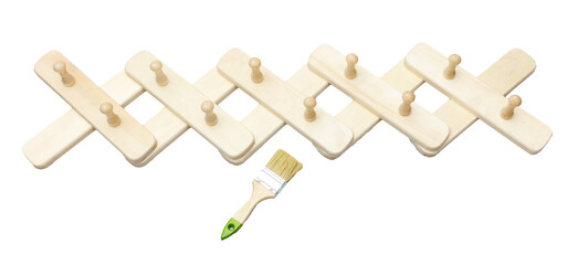 A wooden rack with a brush on it