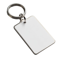 A metallic keychain with a blank white rectangular tag provides a clean template for customization or branding.
