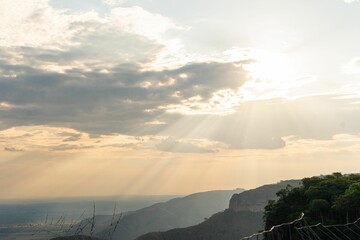 Sun rays over mountain landscape