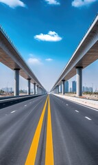 Naklejka premium Scenic View of Open Highway Under Bridge with Blue Sky and Clouds in Urban Landscape