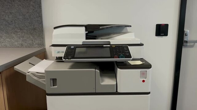 Photocopier office print scan copy fax business machine wide front on view