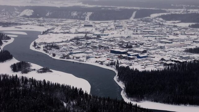 Snowscape Town Of Whitehorse In Yukon Territory, Canada. Aerial Drone Shot