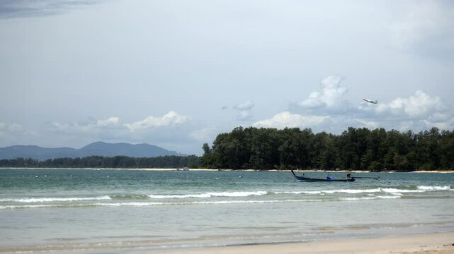 Airplane taking off from Phuket International airport, Thailand.