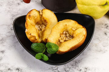Baked quince with honey and cedar