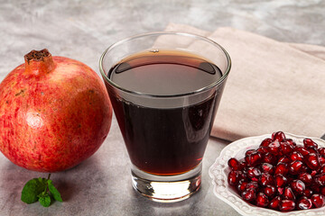 Sweet fresh pomegranate juice with fruit