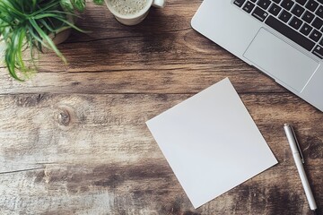 Blank paper, laptop, coffee, plant, wood desk, mockup, workspace
