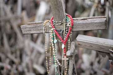 Thousands of religious symbols, crucifixes, rosaries, rosary and catholic crosses with Jesus, Hill...