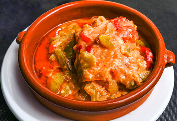 Cod with peppers, fried tomato sauce.