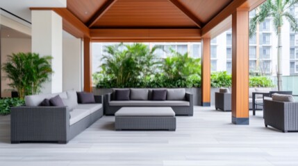 Naklejka premium Modern Outdoor Lounge Area with Stylish Furniture and Lush Greenery in a Relaxing Space