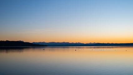 Scenic view of the lake Ammersee in Upper Bavaria with German Alps