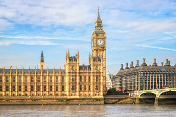 View to Palace of Westminster across river Thames, London. Copy space in sky.