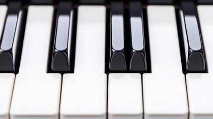 Naklejka premium Close up view of a pianos black and white keys