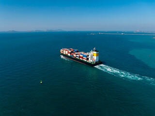 container ship sailing full speed with beautiful wave pattern line, cargo logistic and...