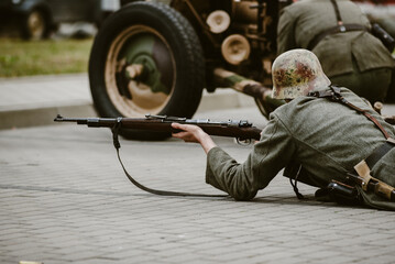 Historical reenactment of World War II, the fight between the Nazis and the Poles.