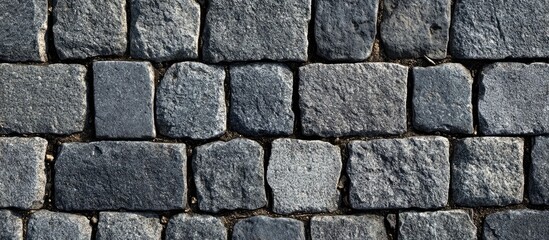 Gray square rock bricks on the pavement floor. with copy space image. Place for adding text or design