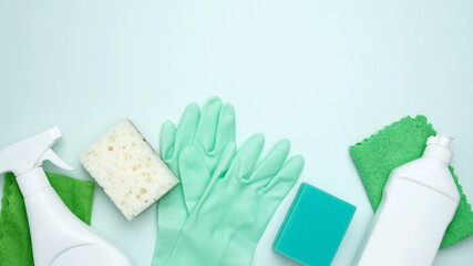 Concept of cleanliness and hygiene. Cleaning supplies and tools, including bottles, gloves, sponges, cloths