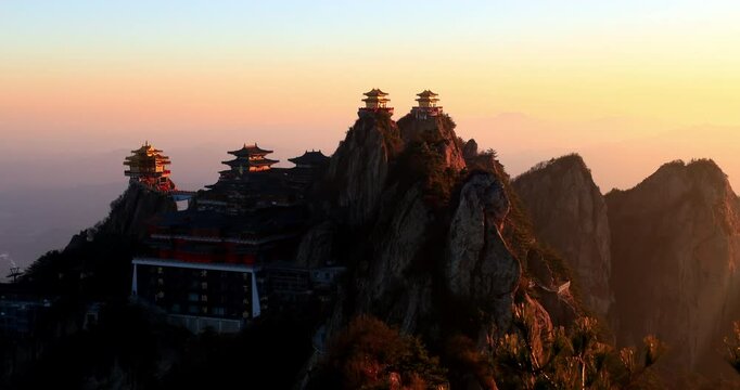 Time lapse of sunrise over Laojun Mountain Taoist Temple. Laojun Mountain scenic spot in Luoyang is said to be the place where Li Er (Lao Zi), the first ancestor of Taoism, retired and cultivated. 