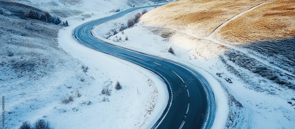 Poster Aerial view of a road in a snowy valley. with copy space image. Place for adding text or design