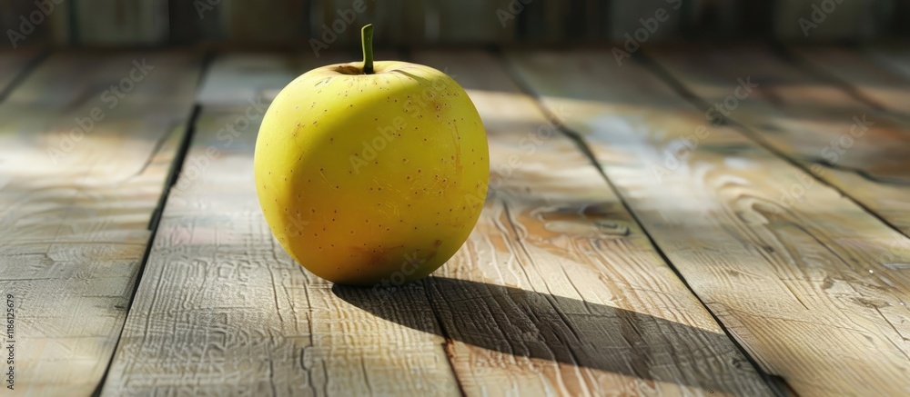 Poster yellow apple resting on a wooden surface. with copy space image. place for adding text or design