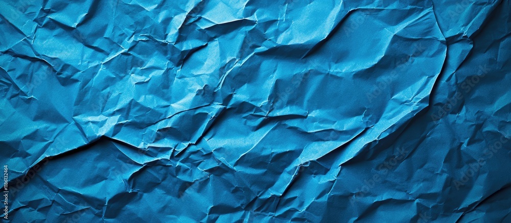Poster Close up of a blue crumpled piece of construction paper used as a background with blank space for design Blue creased crumpled paper backdrop. with copy space image. Place for adding text or design