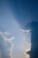 The beauty of sun shines through the clouds.