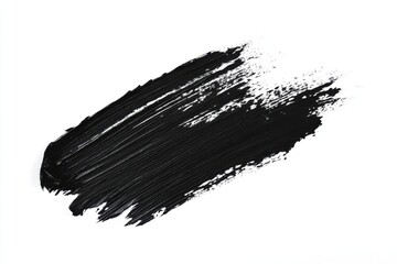 Bold black paint brush stroke isolated on white background
