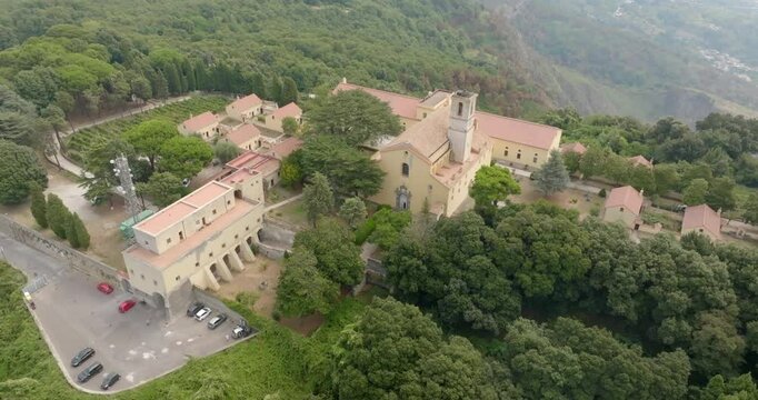 Aerial view of the Camaldoli Hermitage in Naples, Italy. It is an ancient religious complex with a Catholic church and located on top of a mountain.