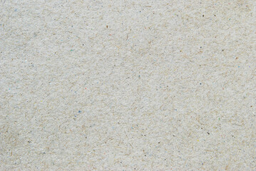 A sheet of recycled cardboard texture as background