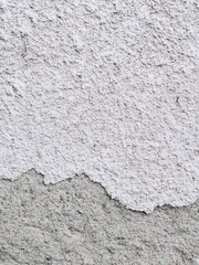 Old wall divided by falling surface