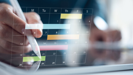 Calendar planner organization management remind, event planning concept. Manager using digital tablet for business event planning on digital calendar planner at office. electronic organizer