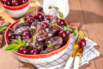 Sweet dessert chocolate dumplings vareniki with cherries