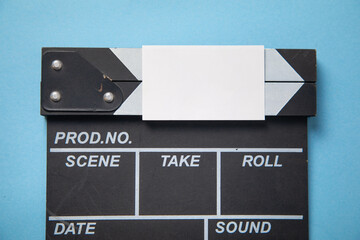Black clapper board with a empty card.