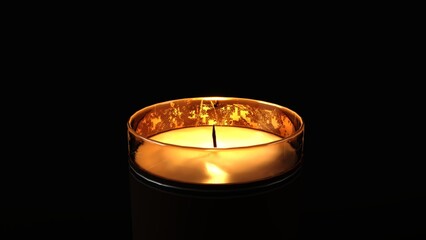 Burning candle isolated on a black background. Closeup flame burning in candle isolated on dark background. Candle fire flame	
