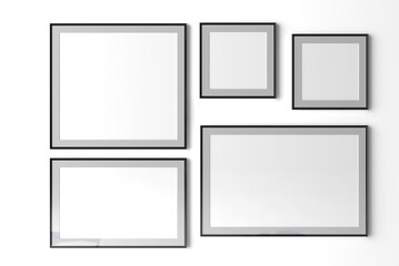 Black frames collection, five blank frameworks set isolated on white wall, interior decor mock up.