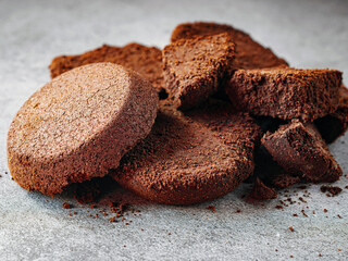 Close-up of coffee grounds from espresso machine. coffee ground on gray background