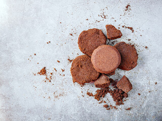 Top view of coffee grounds from espresso machine. coffee ground on gray background