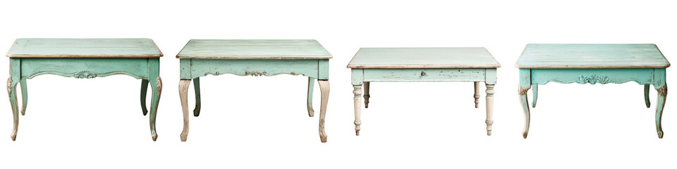 Group of antique wooden tables in various distressed finishes and styles arranged in a rustic...