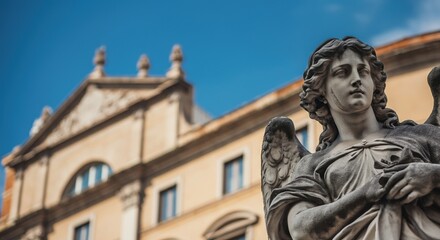 Fototapeta premium Majestic angel statue against a historic building backdrop