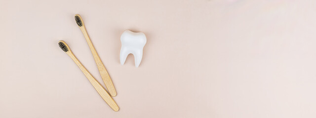 Bamboo eco-toothbrushes and healthy white tooth. Banner, eco-friendly consumption, dental health,...