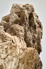 Close-Up Of a big Rock Against White Background
