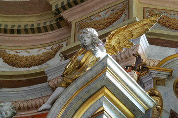 Angel on the altar of Our Lady of Lourdes in the parish church of St. John the Baptist in Recica, Croatia