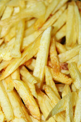 Background full of natural fried potatoes