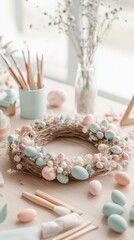Pastel easter wreath with decorative eggs on wooden table in sunlit room