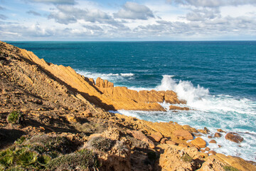 Port aux Princes, Tunisia, Cliffs and Rocks, Mediterranean Sea landscape with beautiful blue sky. Heavenly Escape. Takelsa