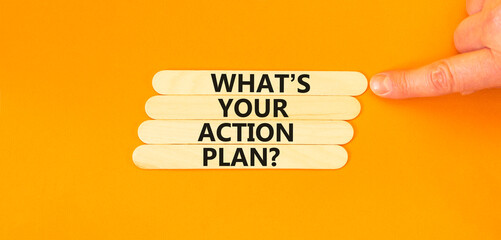 Action plan symbol. Concept words What is your action plan on beautiful wooden sticks. Beautiful orange table orange background. Businessman hand. Business What is your action plan concept. Copy space