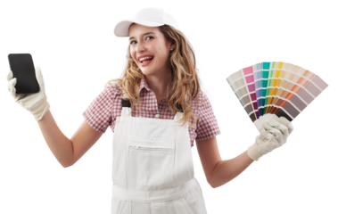 Happy Woman in painters overalls showing phone and paint samples for online shopping and choose of colors and products to painting home walls and renovate house, holding color swatches of paint store