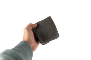 Young male hand holding a cleaning cloth isolated cutout no background