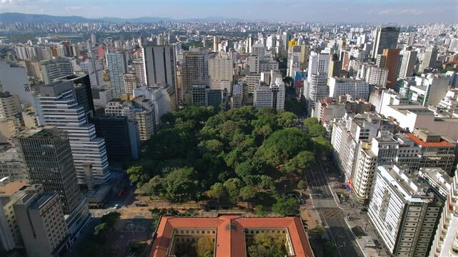 Aerial view of Republica square, in Republica neighborhood, downtown Sao Paulo, Brazil, during a blue sky early morning.
