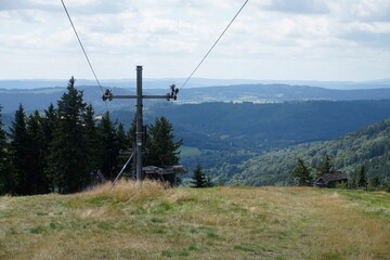 Meadow with a ski lift in summer - Owl Mountains, Poland
