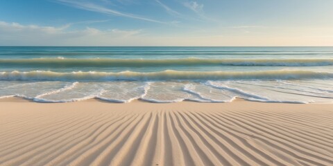beautiful sandy beach and soft blue ocean wave